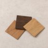 Three solid oak coasters in Natural, Light and Dark oak finishes
